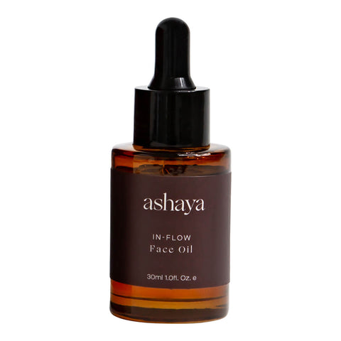 30ml dropper bottle of ashaya In-Flow Face Oil, a formula designed to support the skin during the menstrual years. This natural antioxidant botanical oil, infused with precious ingredients, helps reduce the first signs of aging, improve uneven skin tone, and soothe inflammation. Gently scented to calm and comfort you throughout your cycle. Suitable for all skin types.