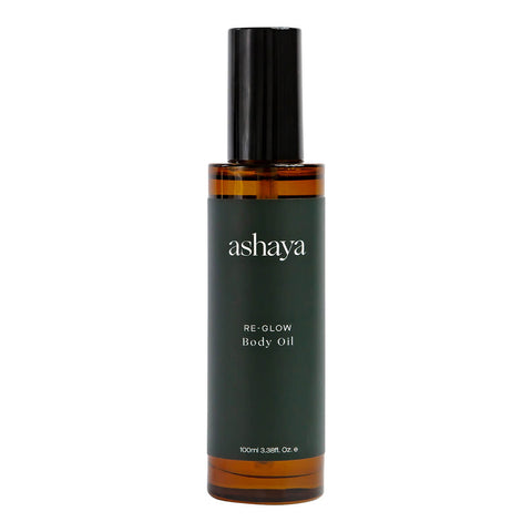 100ml bottle of ashaya Re-Glow Body Oil, a formula designed to support the skin during the perimenopausal years. This healing botanical oil blend is infused with precious ingredients to help firm, nourish, and deeply hydrate the skin. Gently scented to soothe you throughout perimenopause. Suitable for all skin types.