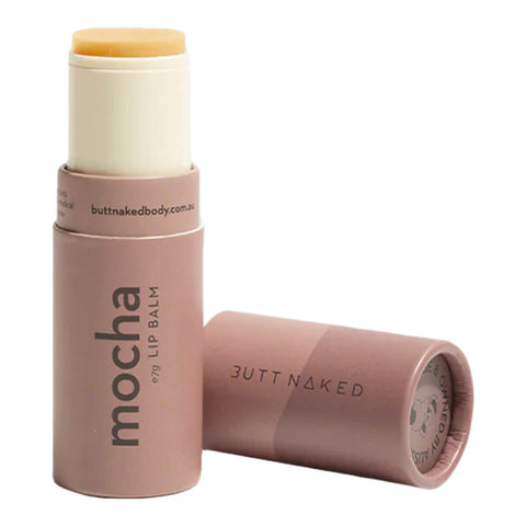 7g tube of Butt Naked Body Lip Balm in Mocha flavour, a vegan lip balm made with nourishing ingredients like jojoba, argan, and sweet almond oil designed to nourish, moisturise, and smooth dry lips. Mocha flavour features coffee oil and virgin cocoa butter. Packaged in a light brown cardboard tube.