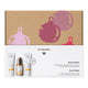 Dr Hauschka Rose Ritual Christmas Set, a 3-step morning care ritual box, featuring deluxe sample sizes of Soothing Cleansing Milk, Facial Toner, and a full size tube of Rose Day Cream. The box design is elegant and minimalistic, showcasing the brand's signature natural skincare products.