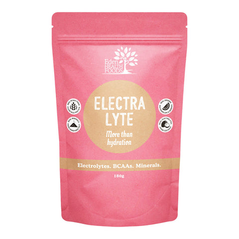 Front view of a plain yellow 180g packet of Eden Healthfoods Electralyte in Watermelon & Berry flavour. The packet has a solid hot pink colour with no additional design elements. The label highlights the product’s key features: BCAAs from clean rice protein, real organic flavours, minerals from unrefined salt, and wholefood-sourced electrolytes.