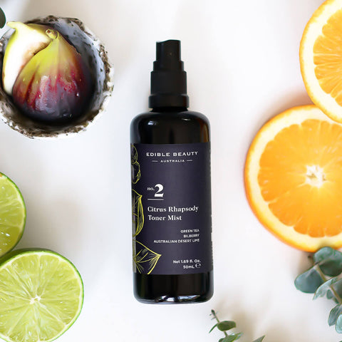 50ml bottle of Edible Beauty No.2 Citrus Rhapsody Toner Mist, hydrates, smooths, and firms skin tone for a dewy complexion. With Green tea, niacinamide. and Australian desert lime.