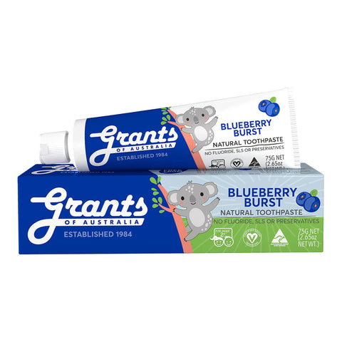 Tube of natural toothpaste for kids in blueberry flavour sitting on top of box.