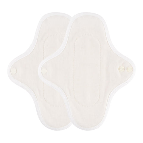 Inside view of a hannahPAD reusable pantyliner made from certified organic cotton, featuring double snap fasteners and silicone grips to prevent slippage.