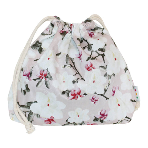 hannah Waterproof Wet Bag to keep your reusable cloth pads organised. Features 2 compartments to separate clean and used pads, a waterproof lining on the inside, and a secure drawstring closure. Pink floral design.