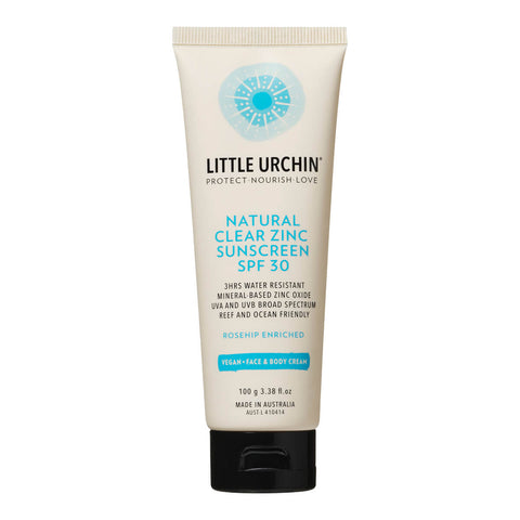 Front view of 100ml bottle of Little Urchin Natural Clear Zinc Sunscreen SPF 30, a hydrating, vegan formula that provides UVA and UVN broad spectrum protection from the sun while also being 4 hours water-resistant. Packaged in a cream tube with minimal blue and black text on the label.