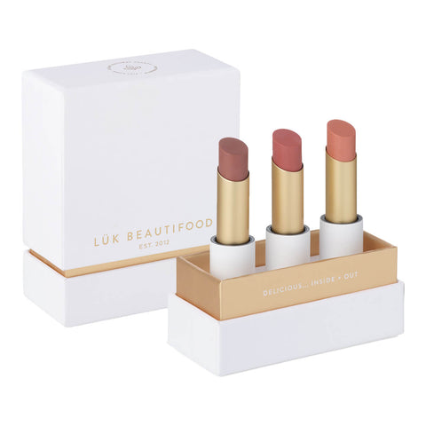 Luk Beautifood Lip Nourish Trio - Perfect Nudes gift set, featuring award winning Lip Nourish in a curated set of three flattering nude shades to create an understated chic look. Contains shades Tea Rose, Nude Pink, and Peach Melon.