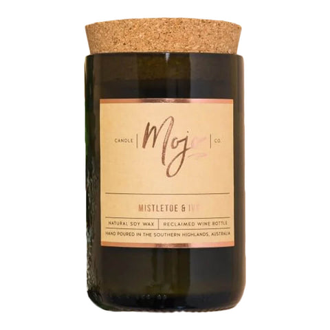 Mojo Candle Co. mistletoe and ivy scented candle, hand-poured into a reclaimed wine bottle with natural soy wax.