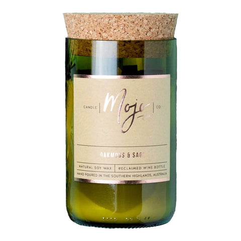 Mojo Candle Co. oakmoss and sage scented candle, hand-poured into a reclaimed wine bottle with natural soy wax.