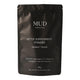 180g resealable bag of Mud Organics Detox Supplement Powder, featuring a blend of fulvic acid and Omegia™ powder (sea buckthorn) to support natural detoxification. Promotes renewed energy, improved mental clarity, collagen formation, and a healthier immune system. Packaged in a black plastic bag.