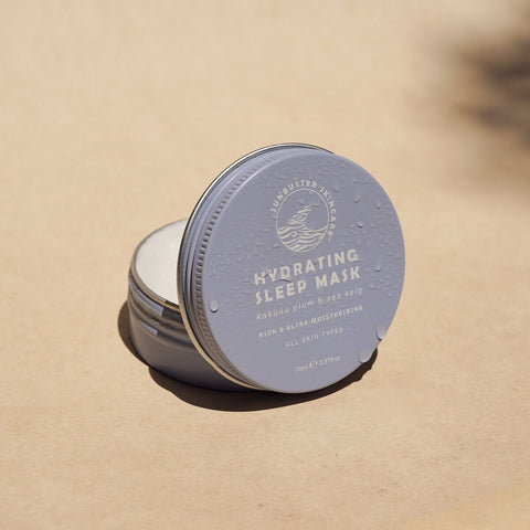 Open tin of hydrating sleep mask with kakadu plum and sea kelp.