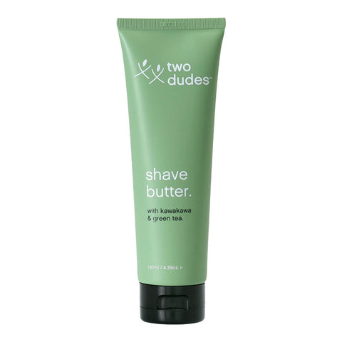 120ml bottle of Two Dudes Shave Butter enriched with kawakawa and green tea that fights razor burn, irritation, dryness, bumps, and rashes. Packaged in a light green bottle with minimal white text.