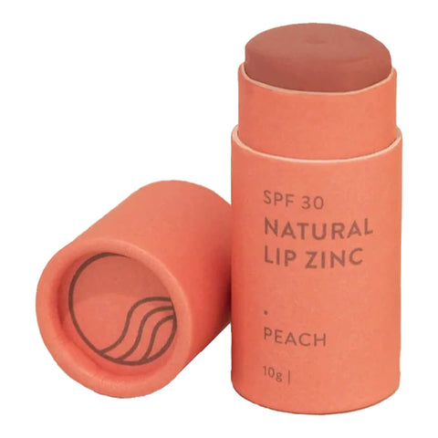 10g stick of Winki Zinc's Tinted Lip Zinc, a mineral-based lip balm designed to heal and protect your lips from the sun while adding a hint of natural colour. Shade Peach, a classic, summery pink. Perfect for a pop of colour on the lips and cheeks (medium pigment).